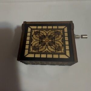 Decorative wind up Music box . Wand up to play “Can’t help falling in love”